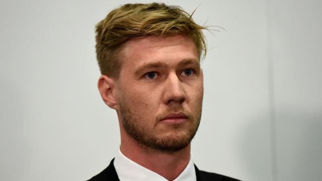 Richmond player Nathan Broad reading a statement to the media at Punt Road Oval. Picture: Kylie Else.