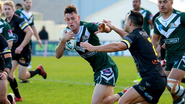 Zac Ryan with the ball for St Marys during the side’s huge 38-4 win against Mounties at St Marys Leagues Stadium. Pictures: Angelo Velardo