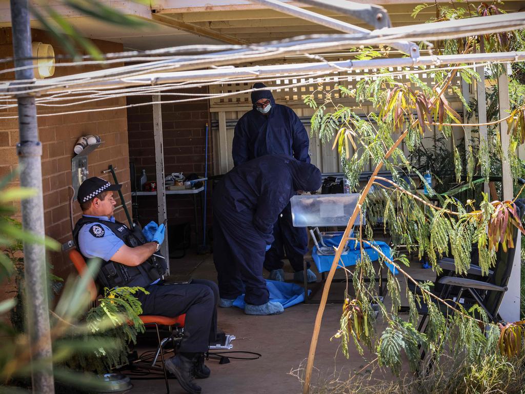 Police forensics search the house where Cleo Smith was found. The property has since been boarded up and is now under guard. Picture: Colin Murty