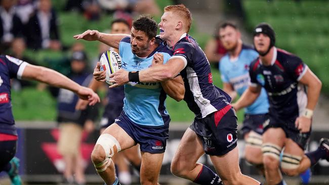 Campbell Magnay of the Rebels tackles the Waratahs’ Jake Gordon back in February. Picture: AAP