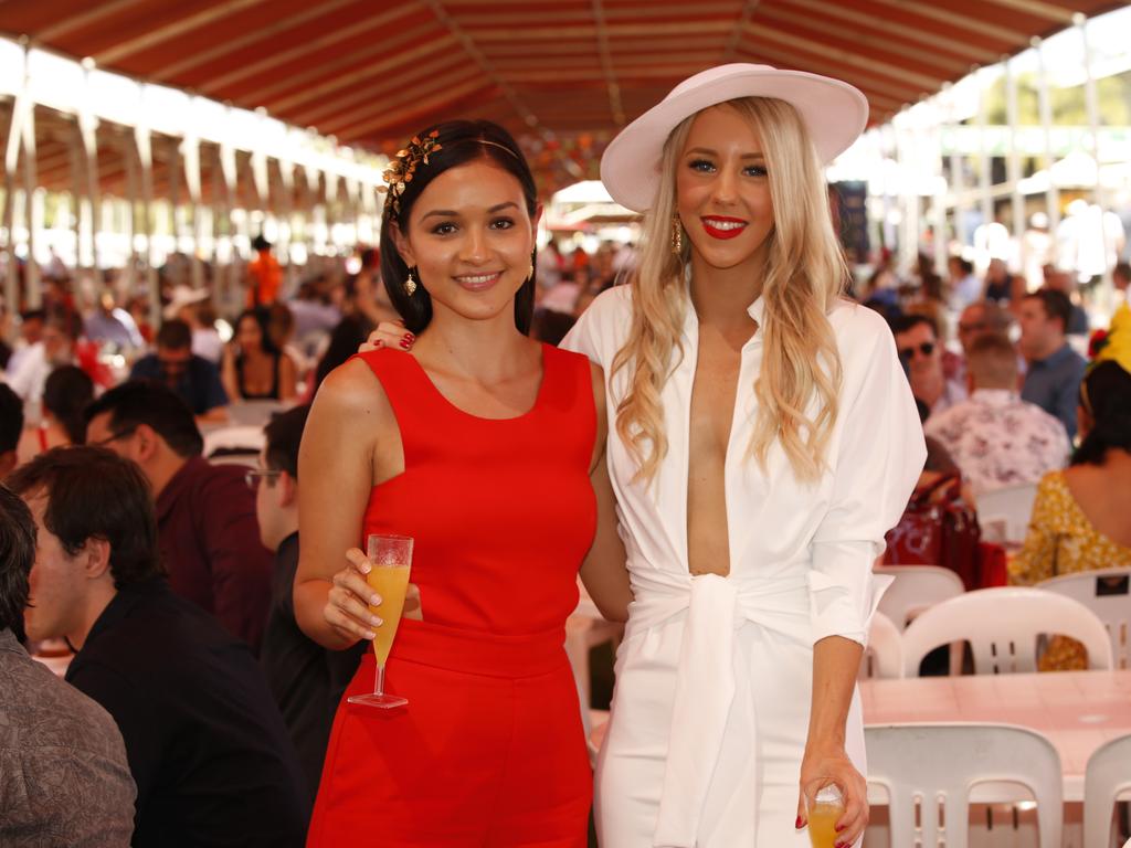 Ellie Chan and Emelia Olsson enjoy the 2019 Darwin Cup. Picture: GLENN CAMPBELL