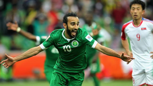 Al Sahlawi Mohammed of Saudi Arabia celebrates after scoring against North Korea.