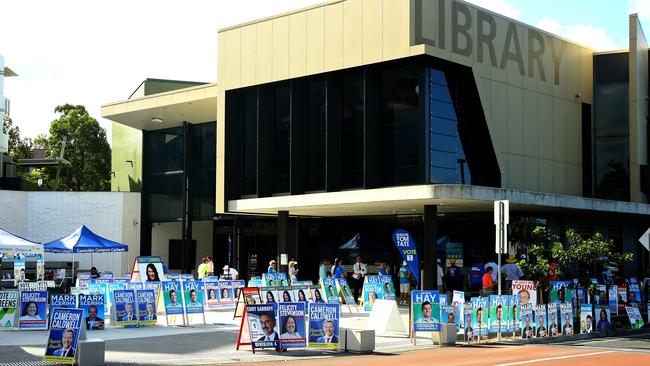 Signs scattered around Helensvale Library during the 2016 poll. Picture: David Clark.