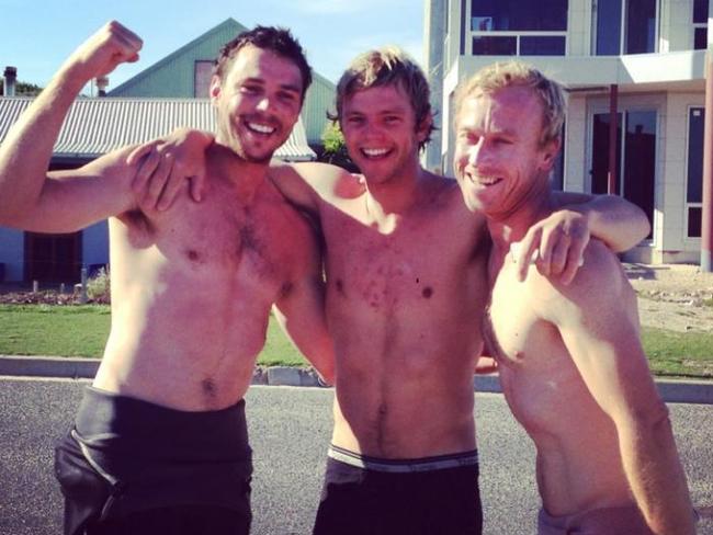 GREAT ESCAPE: Elliston shark attack survivor Andrew McLeod (left), with mates Tyrone Swan and Sam Jervis, who were also present, after their encounter. Picture: Instagram