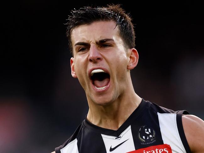 MELBOURNE, AUSTRALIA - AUG 17: Nick Daicos of the Magpies celebrates a goal during the 2024 AFL Round 23 match between the Collingwood Magpies and the Brisbane Lions at The Melbourne Cricket Ground on August 17, 2024 in Melbourne, Australia. (Photo by Michael Willson/AFL Photos via Getty Images)