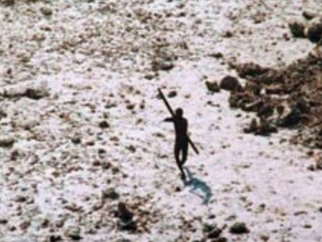 In the wake of the 2004 tsunami this member of the Sentinelese tribe was photographed firing arrows at a helicopter. Picture: Indian Coastguard/ Survival International