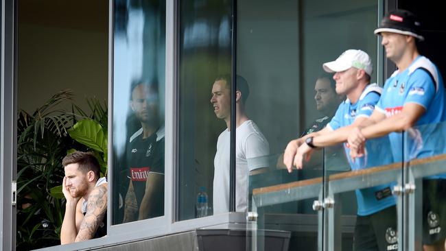 Jeremy Howe (left) and Nick Maxwell (centre) were among the interested parties watching the practice match. Picture: Nicole Garmston