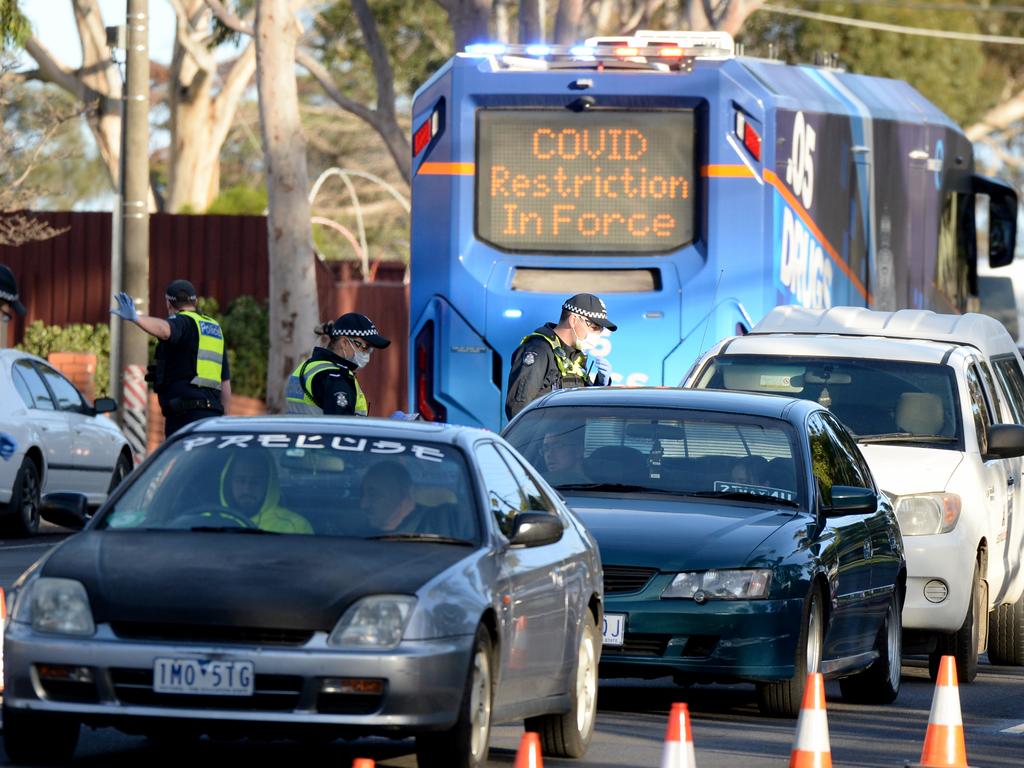 Police perform random checks on drivers and passengers trying to enter the locked down suburb of Broadmeadows. Andrew Henshaw/ NCA NewsWire