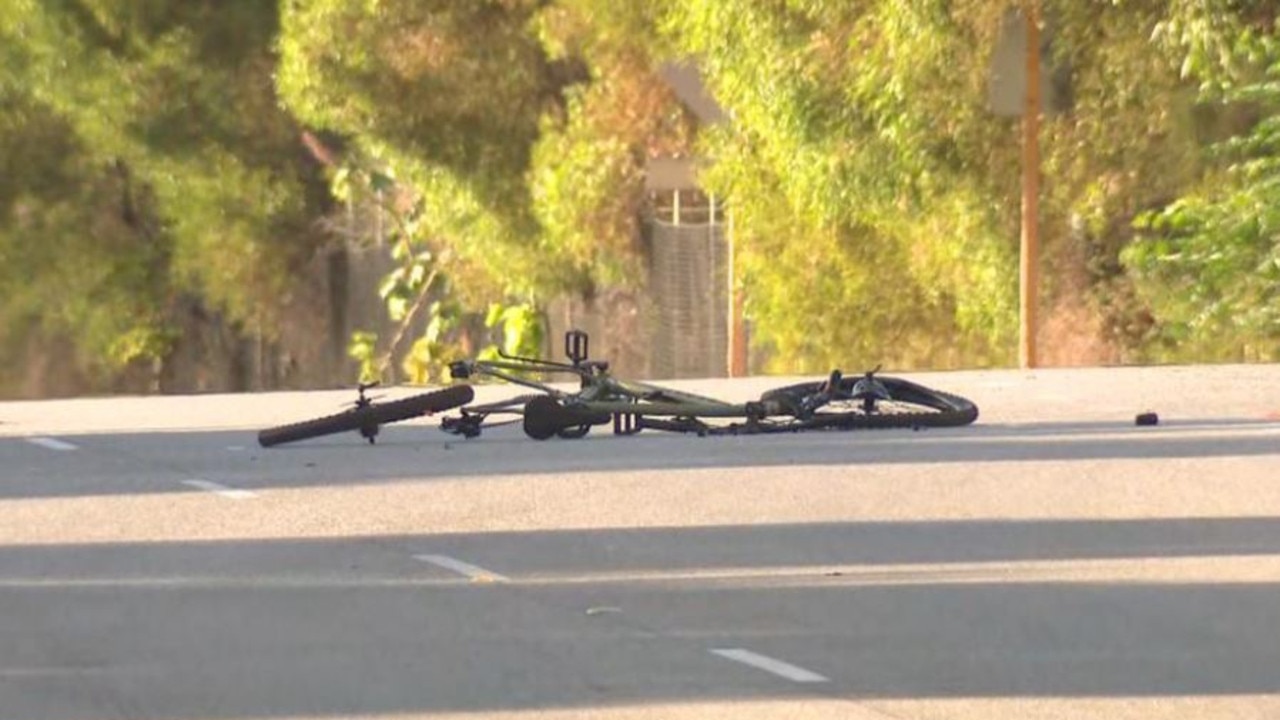 The cyclist died at the scene. The truck driver was uninjured, with crash investigators examining the scene. Picture: 7News