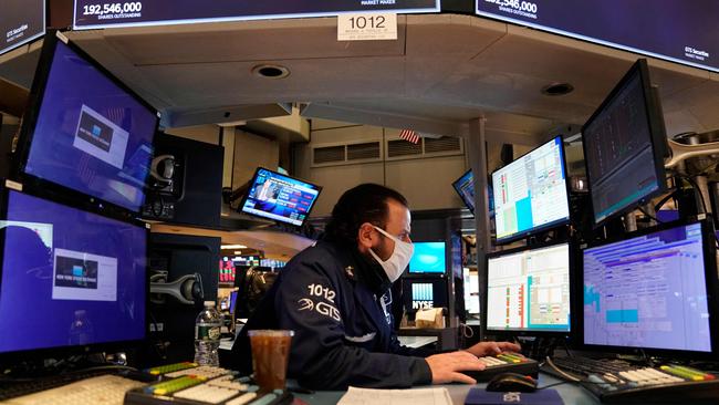 Traders work on the floor of the New York Stock Exchange. Picture: Timothy A. Clary/ AFP.