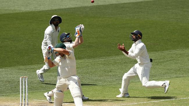 ADELAIDE, AUSTRALIA - DECEMBER 09: Aaron Finch of Australia is caught by Rishabh Pant of India off the bowling of Ravi Ashwin of India during day four of the First Test match in the series between Australia and India at Adelaide Oval on December 09, 2018 in Adelaide, Australia. (Photo by Ryan Pierse/Getty Images)