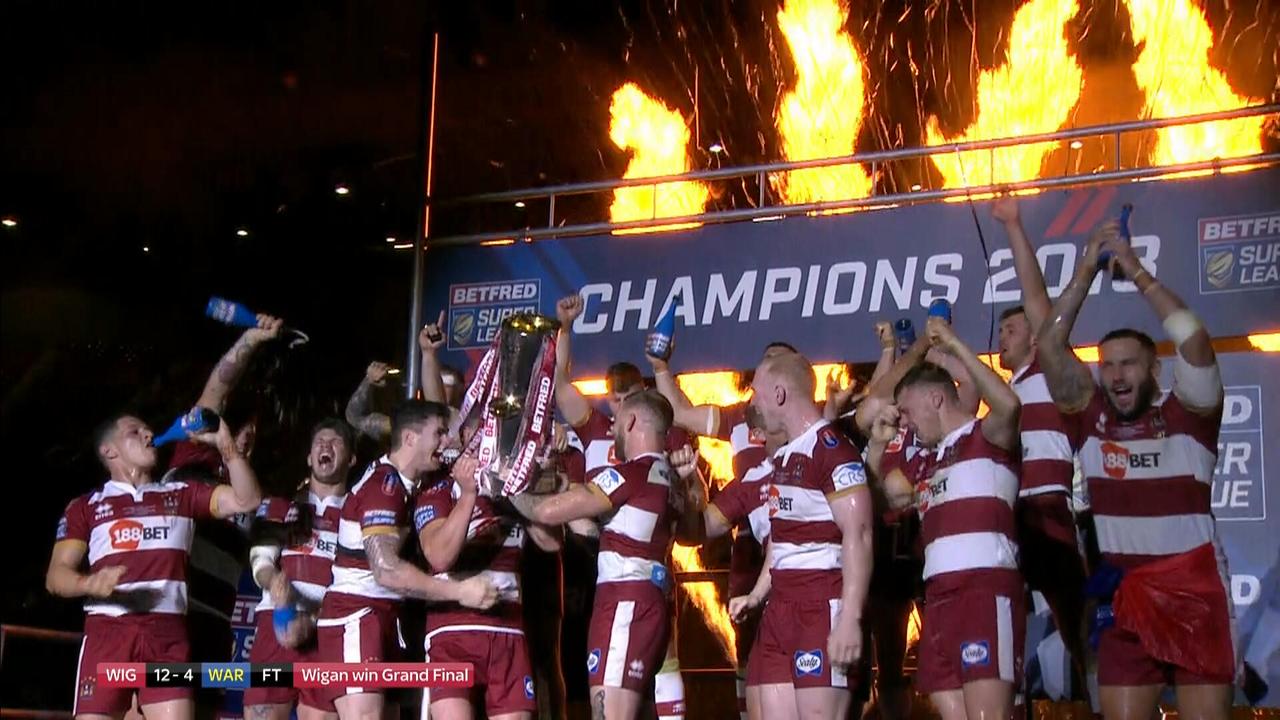 Wigan Warriors celebrate winning the 2018 Super League grand final.