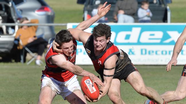 Matt Goodwin and Nathan Croft battle for the ball. Picture: Rob Leeson