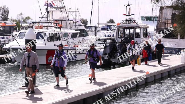 Crew members are brought to Batemans Bay. Picture: Alex Coppel