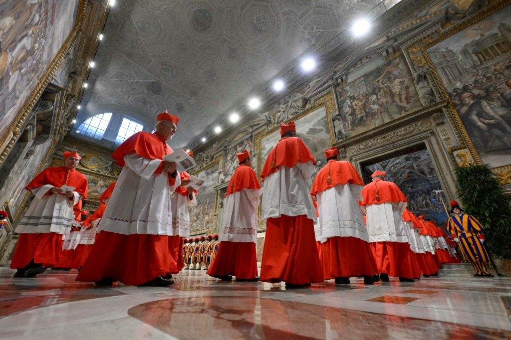 All eyes on Sistine Chapel chimney as conclave enters day two