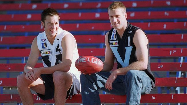 The captains of Vic Country (Jimmy Bartel) and Vic Metro (Chris Judd) before the 2000 national under-18 championships.