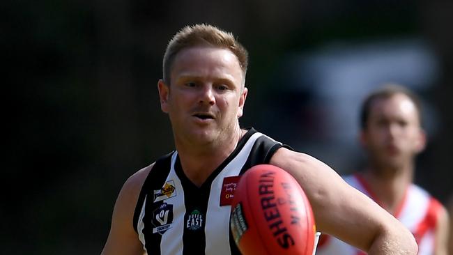 Michael Collins playing for Narre Warren in 2019. Picture: Andy Brownbill