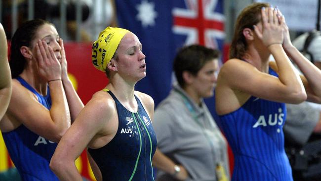 Aust swimmer Giaan Rooney (l) with Rebecca Creedy and Elka Graham disappointed at winning silver medal in 4x200m freestyle relay at 2002 Commonwealth Games in Manchester. 