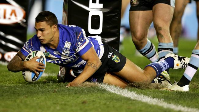 Bulldog's Michael Lichaa scores against the Cronulla Sharks at Belmore Oval last season. He’s worth $331,800 this season. Picture Gregg Porteous