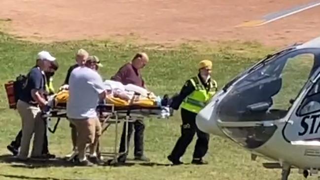 Salman Rushdie is seen being loaded onto a medical evacuation helicopter near the Chautauqua Institution. Picture: Horatio Gates/AFP