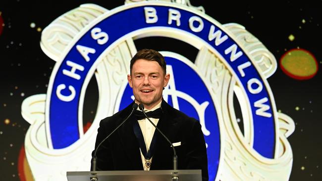 Lachie Neale of the Lions gives a speech after being awarded the 2023 Brownlow Medal.