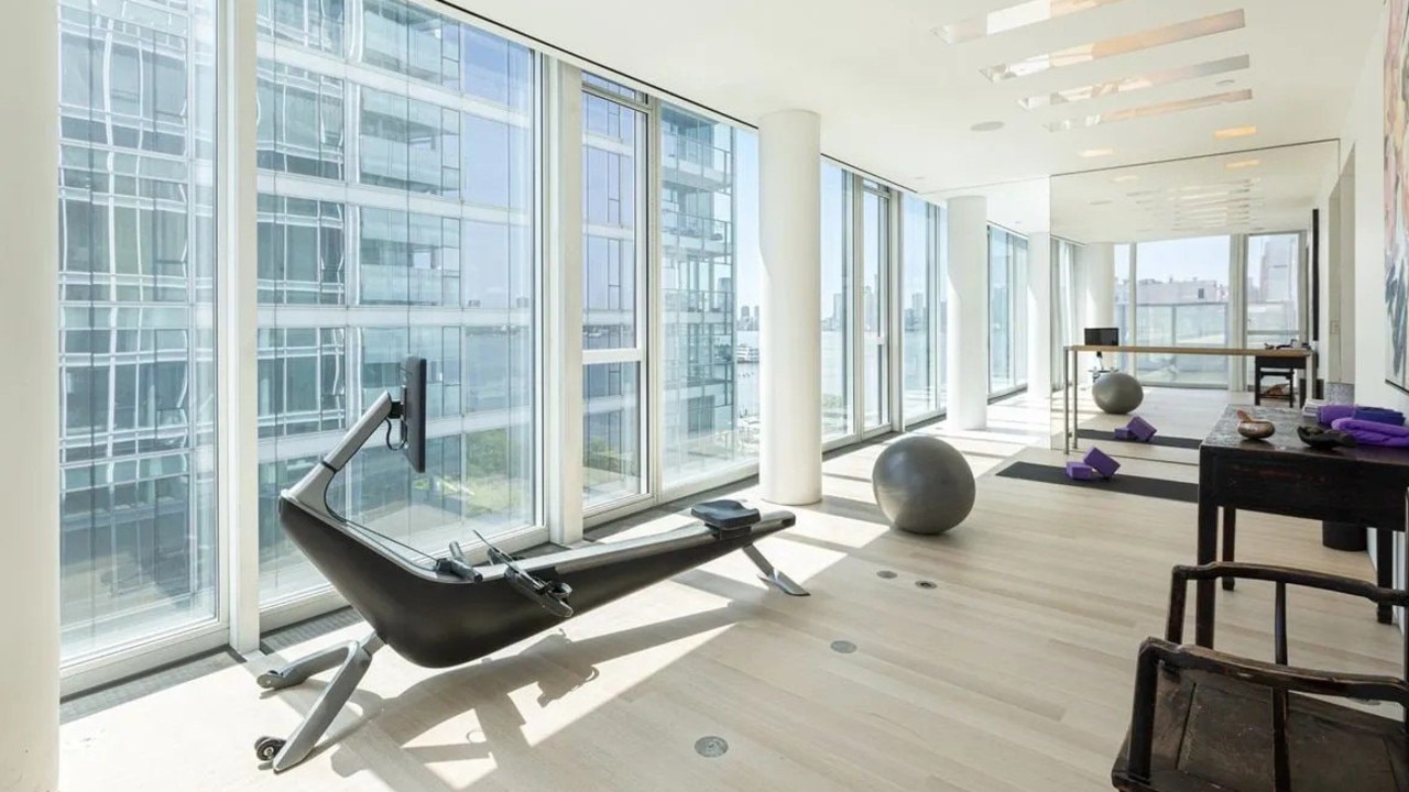 There is also an excerise room, a sauna and windowed walls. Picture: Realtor.com