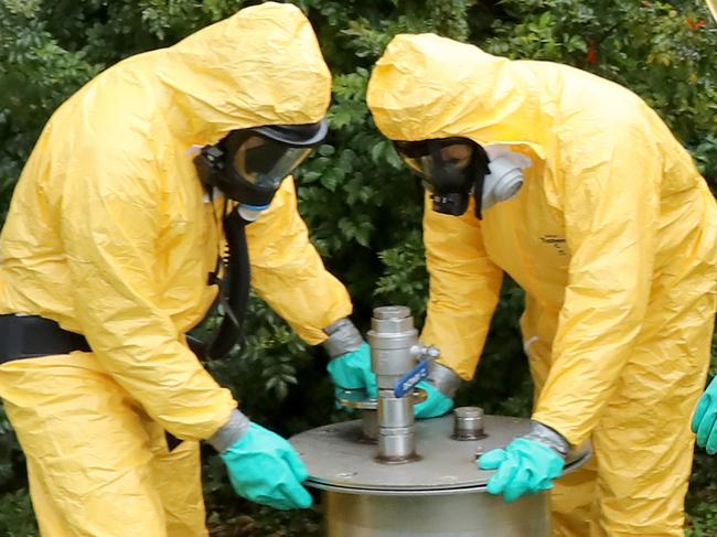 Detectives remove sophisticated drug production equipment from a clandestine drug laboratory, uncovered at Morphett Vale. Drug and Organised Crime Task Force detectives found the lab at a house on Cocks Avenue about 10pm on Tuesday. 20 August 2020. Picture Dean Martin