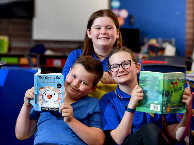 Riley, Natalie, Alicia, all 11 year old students at Hallett Cove South Primary School on Thursday 5 December 2019. Hallett Cove South Primary School was a big improver in NAPLAN, and particularly in reading, from 2014-18. (AAP Image/Sam Wundke)