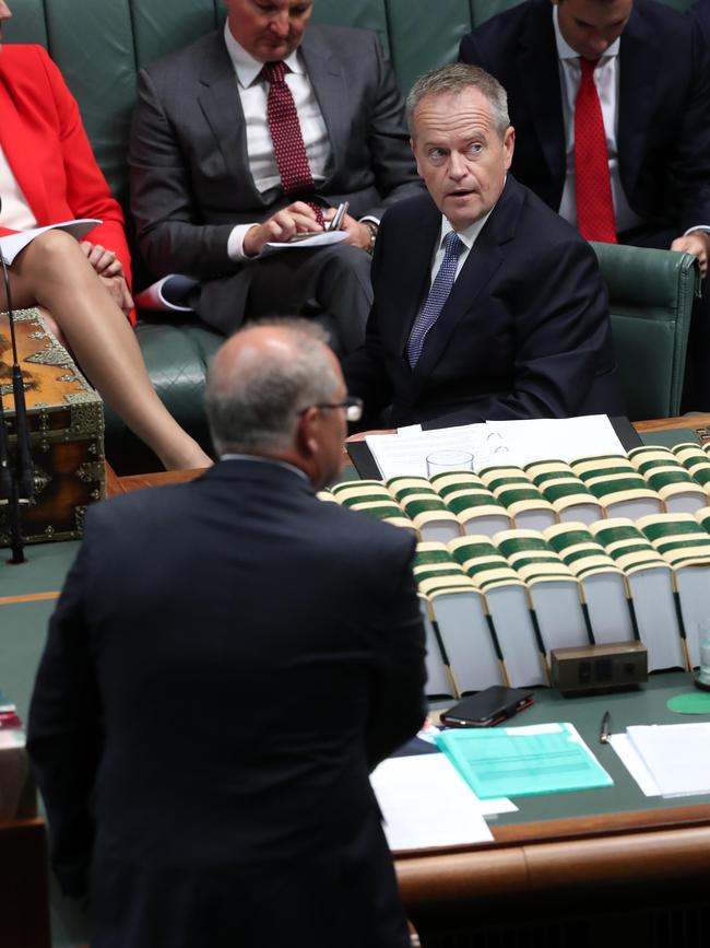 Scott Morrison (bottom) and Bill Shorten go head-to-head in Question Time. Picture: Gary Ramage