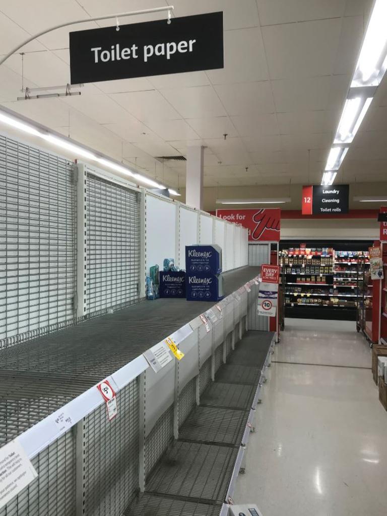 Shelves cleared of loo roll at Coles Grafton.