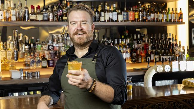 Bartender Jordan McIntyre with 'Nam Jimmy's Margarita' at Luc Lac Asian Restaurant at Queen's Wharf. Picture: Richard Walker