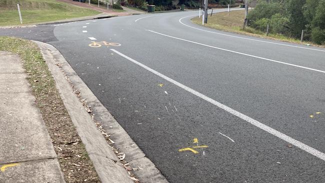 Yellow marks on Sunset Drive which indicate the rider's last movements before he fatally struck a white Toyota Camry. Photo: Elizabeth Neil