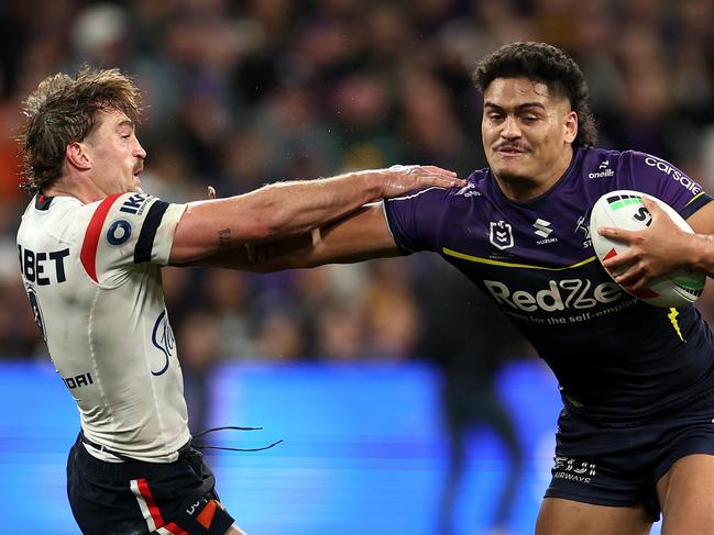 MELBOURNE, AUSTRALIA - SEPTEMBER 27: Shawn Blore of the Storm fends off ConnorÃ&#130;Â Watson of the Roosters during the NRL Preliminary Final match between the Melbourne Storm and Sydney Roosters at AAMI Park on September 27, 2024 in Melbourne, Australia. (Photo by Cameron Spencer/Getty Images)