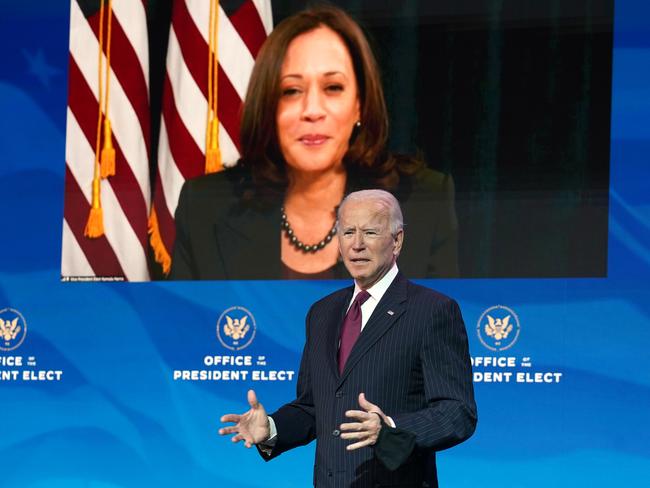 Kamala Harris watches on as Joe Biden speaks. Picture: Kevin Lamarque/AFP