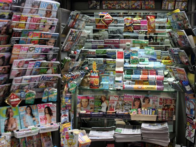 Magazines seen at a news stand in Sydney, 19 Feb 2004 : PicMichael/Caronna /Bloomberg /News - magazine racks store newsagent