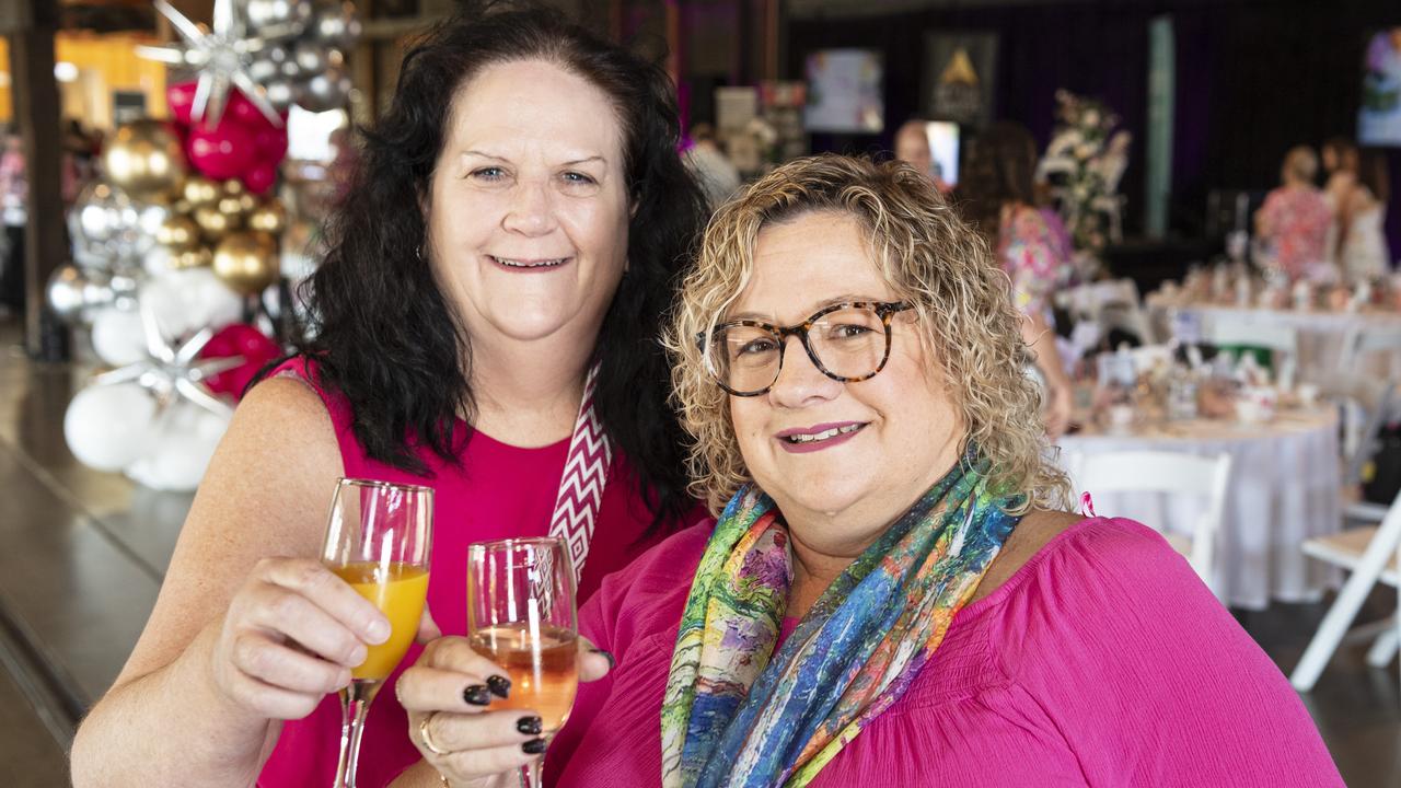 Karen Hobbs (left) and Karyn White at the Pink High Tea fundraiser for Toowoomba Hospital Foundation at The Goods Shed, Saturday, October 12, 2024. Picture: Kevin Farmer