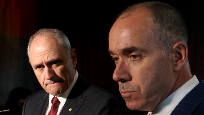 Ken Henry (left) plans to stay at NAB until a replacement is found for CEO Andrew Thorburn (right). Pic: David Geraghty