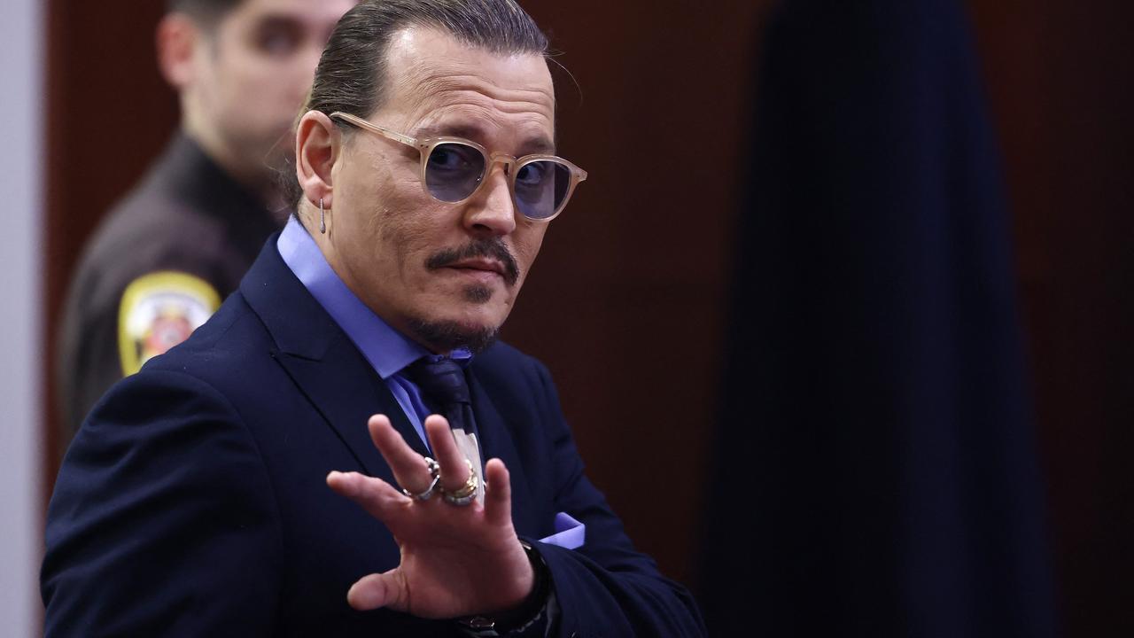 Depp’s lawyers were seen fist pumping in court when Heard mentioned the Moss allegation. Picture: AFP.