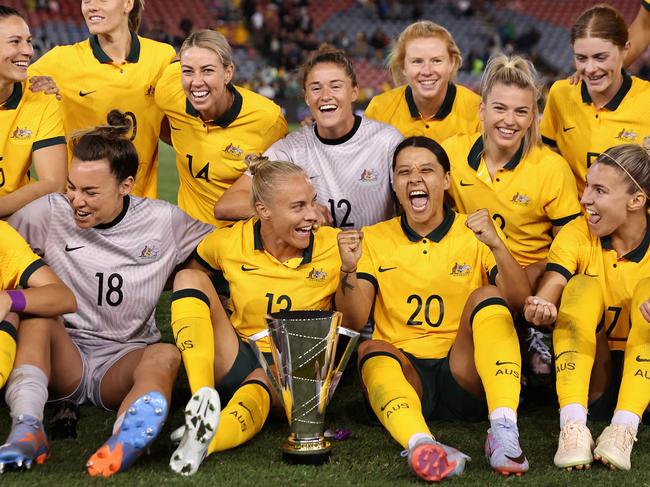 NEWCASTLE, AUSTRALIA - FEBRUARY 22: Sam Kerr of the Matildas signs celebrates with team mates after winning the Cup of Nations match between the Australia Matildas and Jamaica at McDonald Jones Stadium on February 22, 2023 in Newcastle, Australia. (Photo by Cameron Spencer/Getty Images)