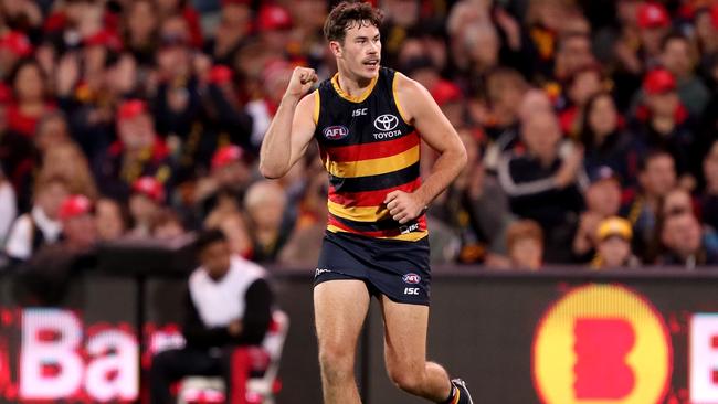 Mitch McGovern celebrates a goal for the Crows. Picture: Getty Images