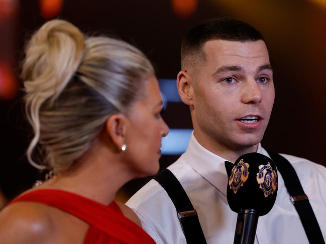 MELBOURNE, AUSTRALIA - SEPTEMBER 23: Rebecca Maddern interviews Jamie Elliott of the Magpies during the 2024 Brownlow Medal at Crown Palladium on September 23, 2024 in Melbourne, Australia. (Photo by Dylan Burns/AFL Photos via Getty Images)