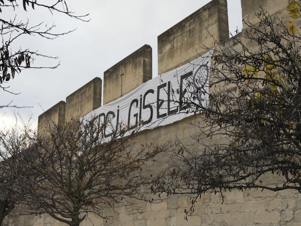 A banner with the words "Merci Gisele" is seen during the verdict in the Pelicot case on December 19 in Avignon, France. Picture: Julien Goldstein/Getty Images)