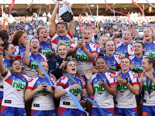 SYDNEY, AUSTRALIA - OCTOBER 02: The Knights celebrate with the NRLW Premiership Trophy after victory in the 2022 NRLW Grand Final match between Newcastle Knights and Parramatta Eels at Accor Stadium, on October 02, 2022, in Sydney, Australia. (Photo by Cameron Spencer/Getty Images)