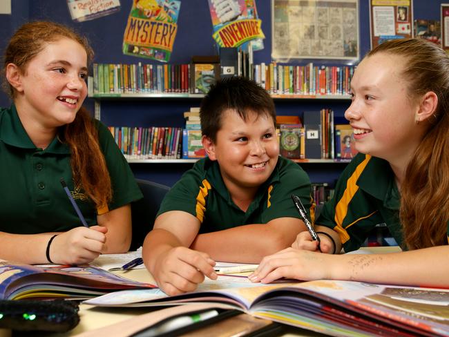 Kensington Public School Year 6 students Edeline Shalhoub, 12, Jonas Dowling, 11, and Georgia Fortmann, 12. Picture: Jonathan Ng
