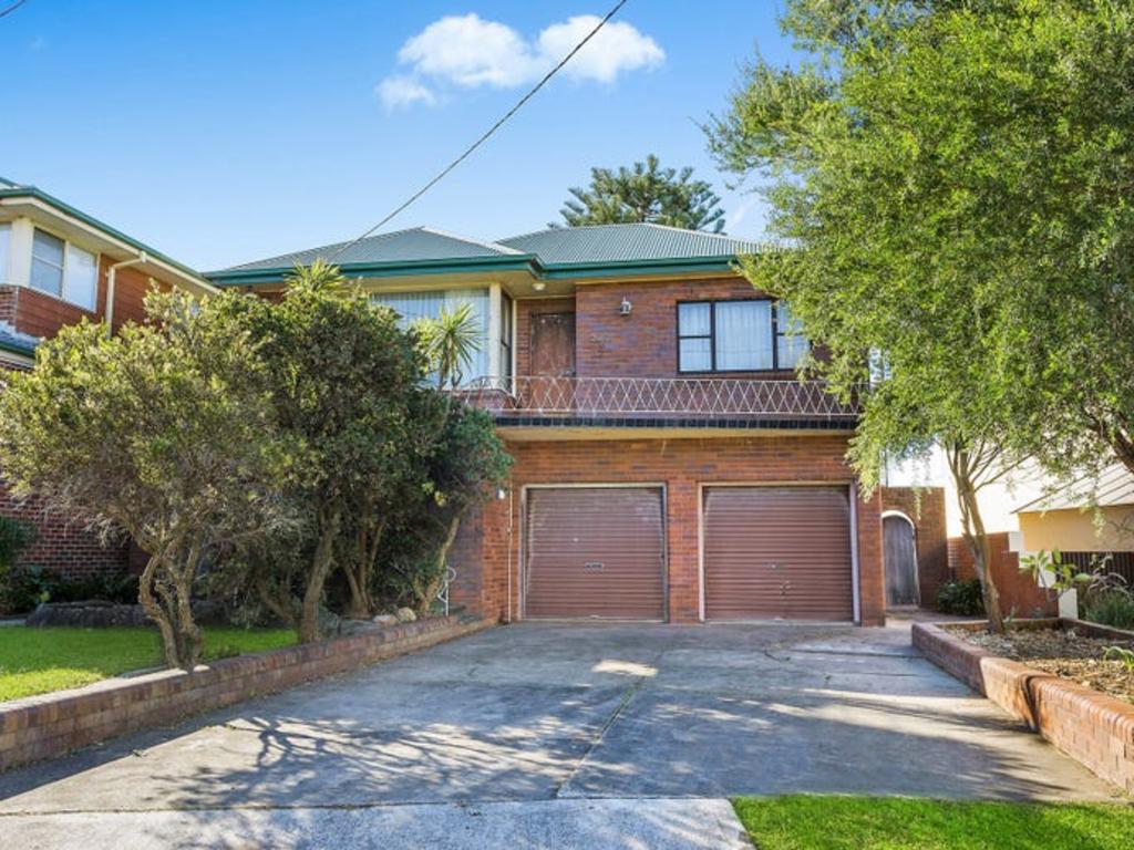 Sold for $4.14m: this fixer upper house in Bulli had a huge auction.