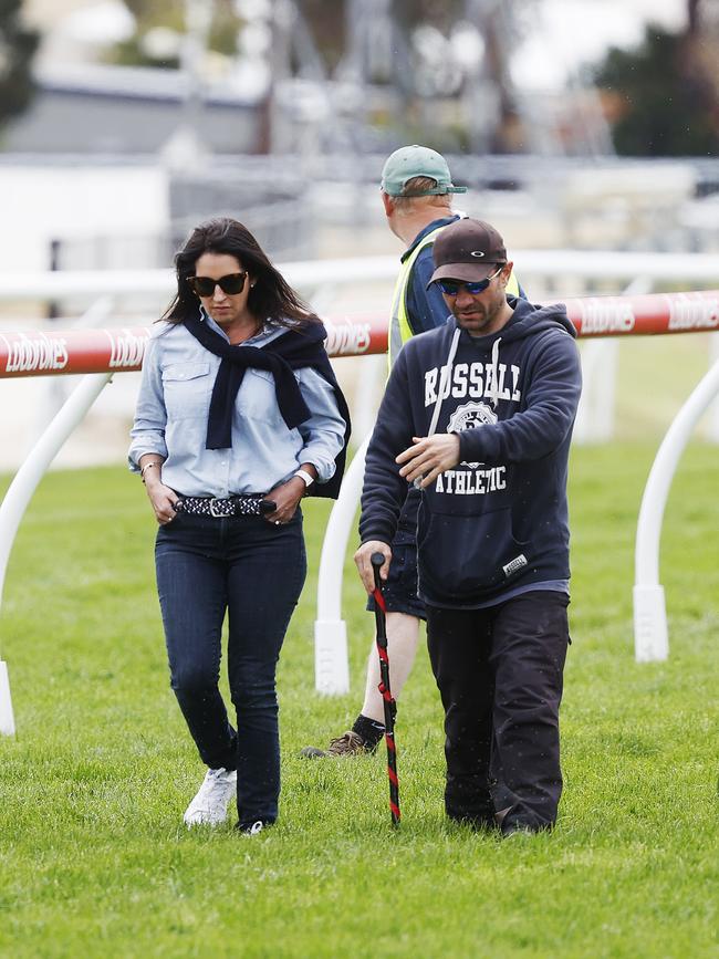 Liberal Minister Jane Howlett alongside jockey David Pires during the track inspection at Elwick Racecourse. Picture: Zak Simmonds