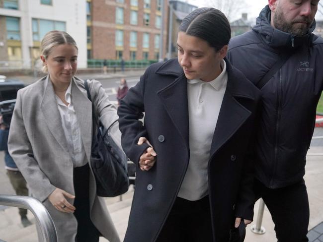 Sam Kerr arrives with fiance Kristie Mewis at Kingston Crown Court, south west London. Picture: Getty