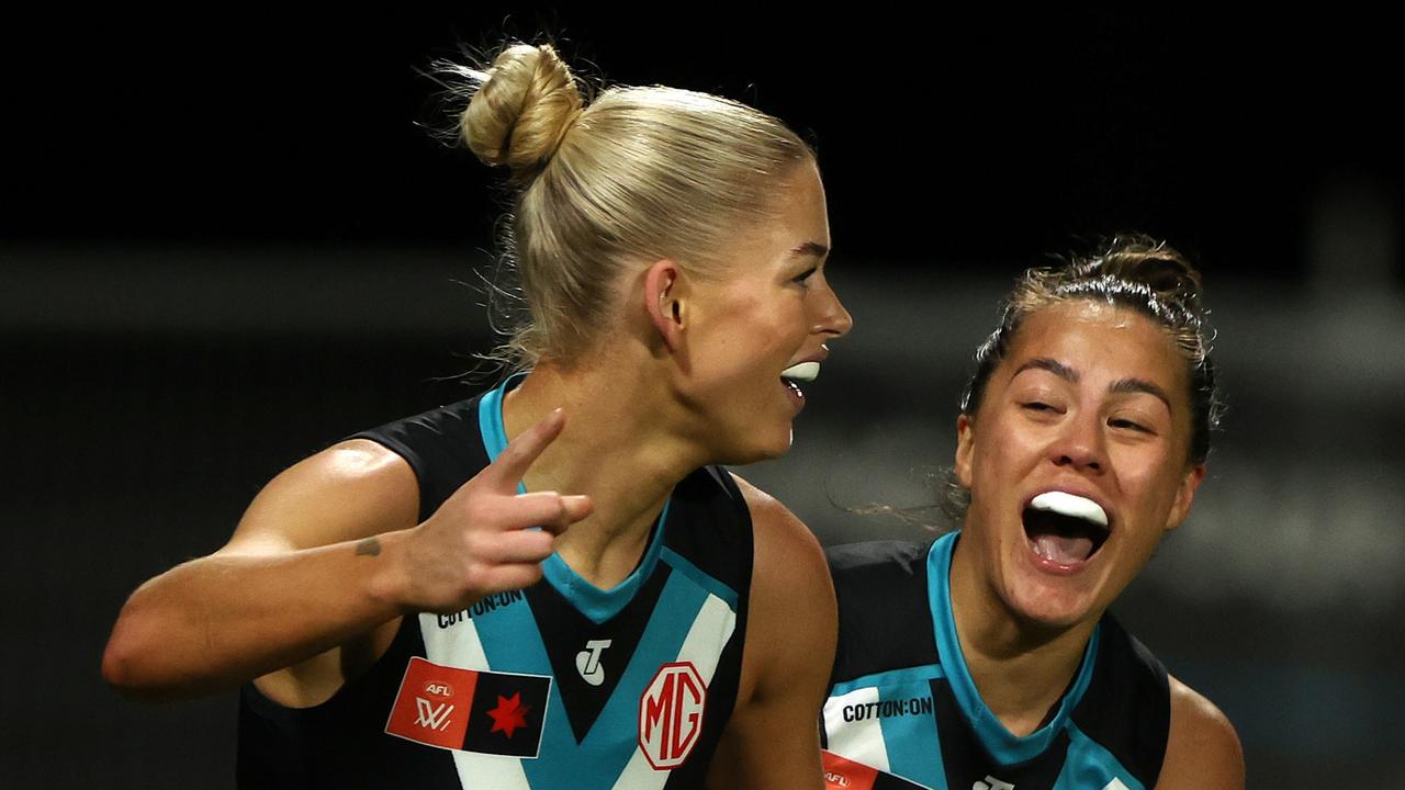 Ashleigh Saint celebrates a goal for Port Adelaide. Picture: Sarah Reed/AFL Photos via Getty Images)