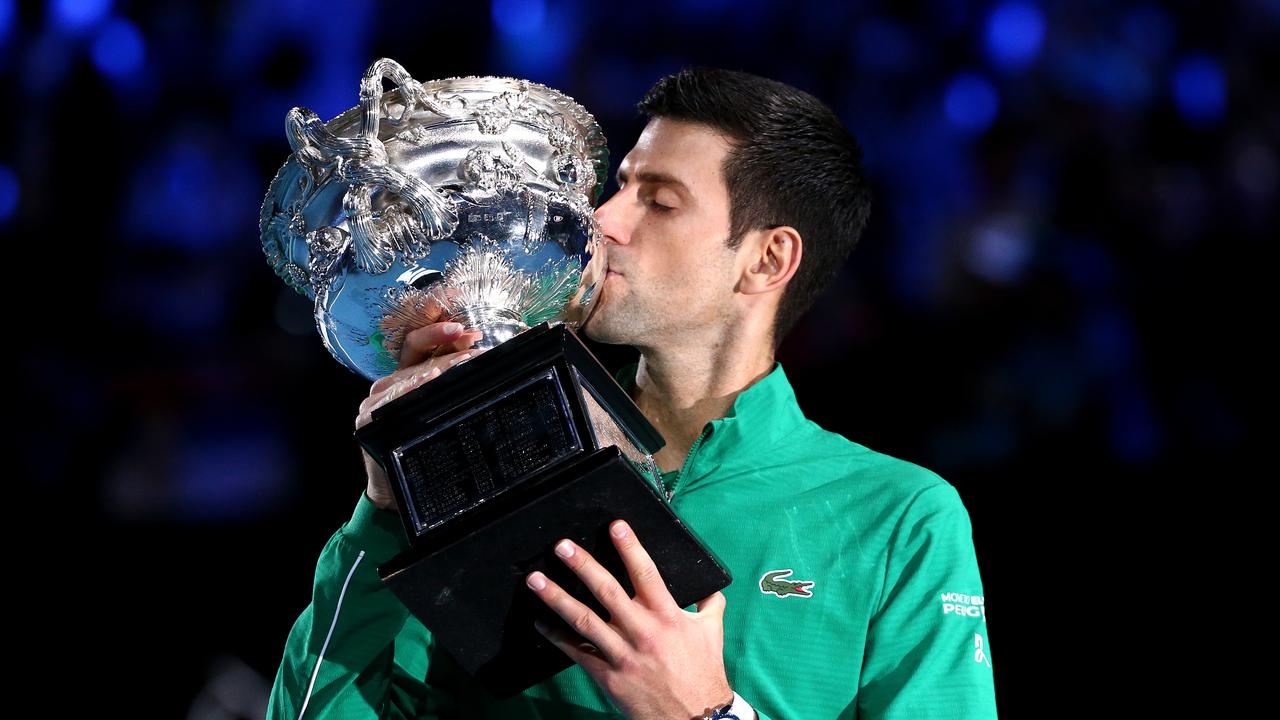 Novak Djokovic with the Norman Brookes Challenge Cup after winning the Australian Open. AAP Image/Rob Prezioso.