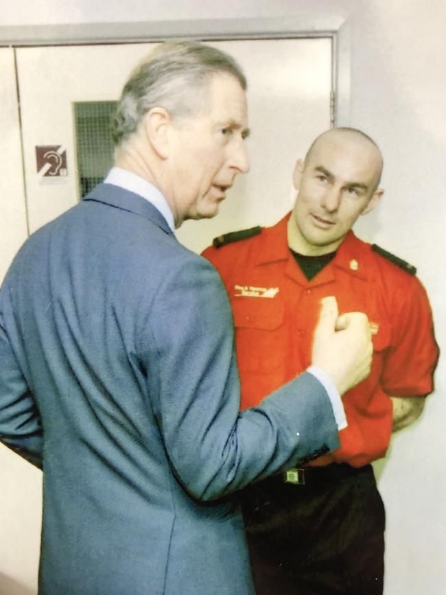 Queensland firefighter Michael Pearce met the then Prince Charles in Luton, England, in 2006, when he was on a one year firefighter exchange trip to the UK. Picture: Supplied